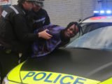 Naira Marley with UK Police