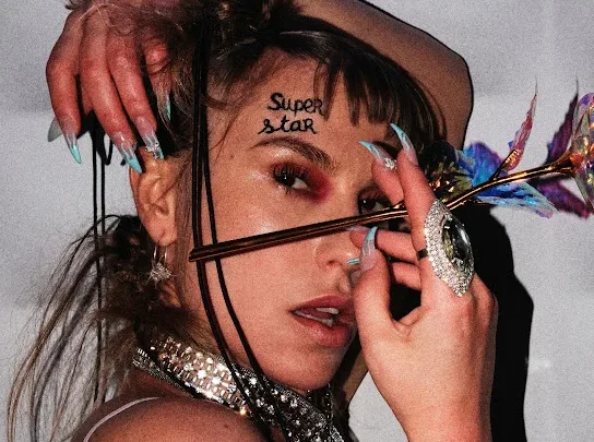 Corina Bud Biography: Ethnicity, Parents, Instagram, Net Worth, Songs, Partner, Height, Religion