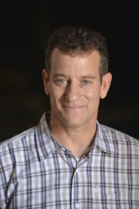 Lew Schneider - Biography
