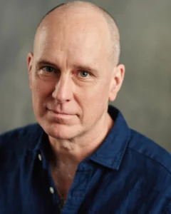 Kelly AuCoin - Biography