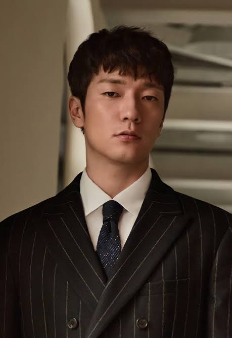 Son Suk-ku - Biography