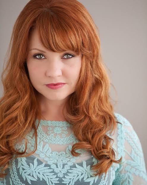 Jamie Marchi - Biography