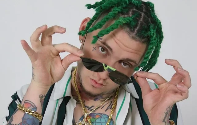 Lary Over Biography: Age, Net Worth, Parents, Siblings, Girlfriend, Songs, Wikipedia