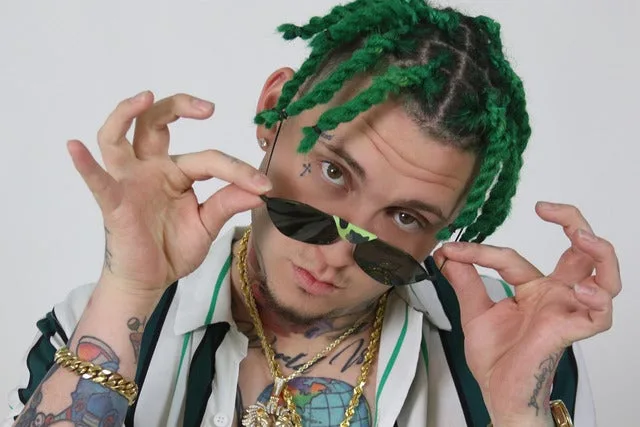 Lary Over Biography: Age, Net Worth, Parents, Siblings, Girlfriend, Songs, Wikipedia