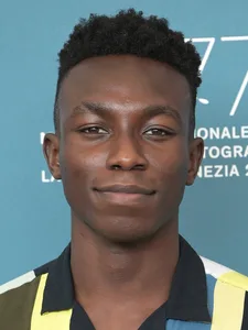 Olly Sholotan - Biography