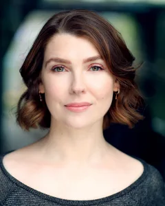 Milly Thomas - Biography