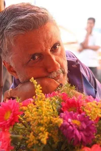Santhivila Dinesh - Biography