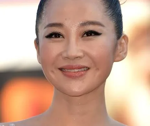 Qing Xu Biography: Ethnicity, Height, Net Worth, Age, Religion, Parents, Awards, Husband