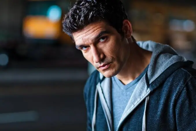 Mark Semos Biography: Awards, Books, Siblings, Religion, Parents, Age, Net Worth, Height, Movies, Wife, Pictures