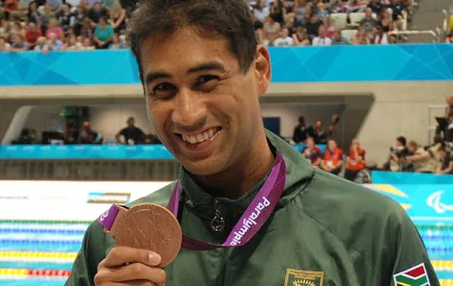 Achmat Hassiem Biography: Awards, Siblings, Age, Records, Net Worth, Height, Parents, Career, Olympics