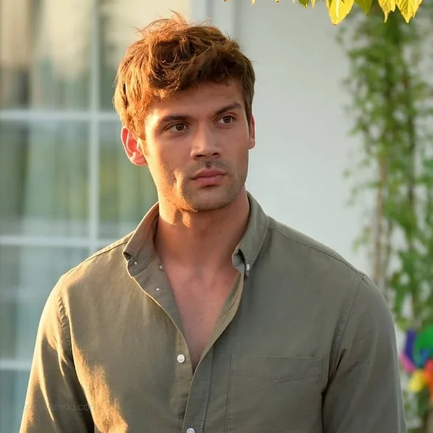 Caner Topçu - Biography